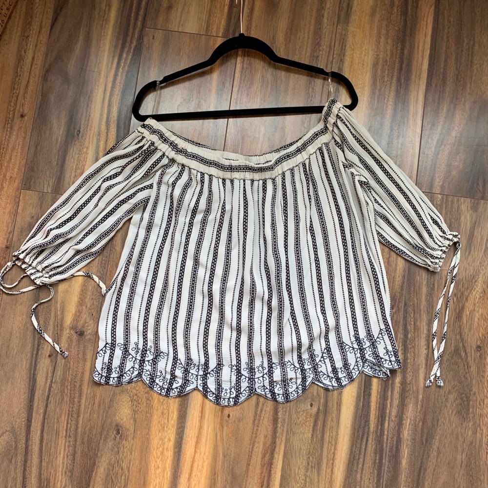 Black and cream/white eyelet off the shoulder top